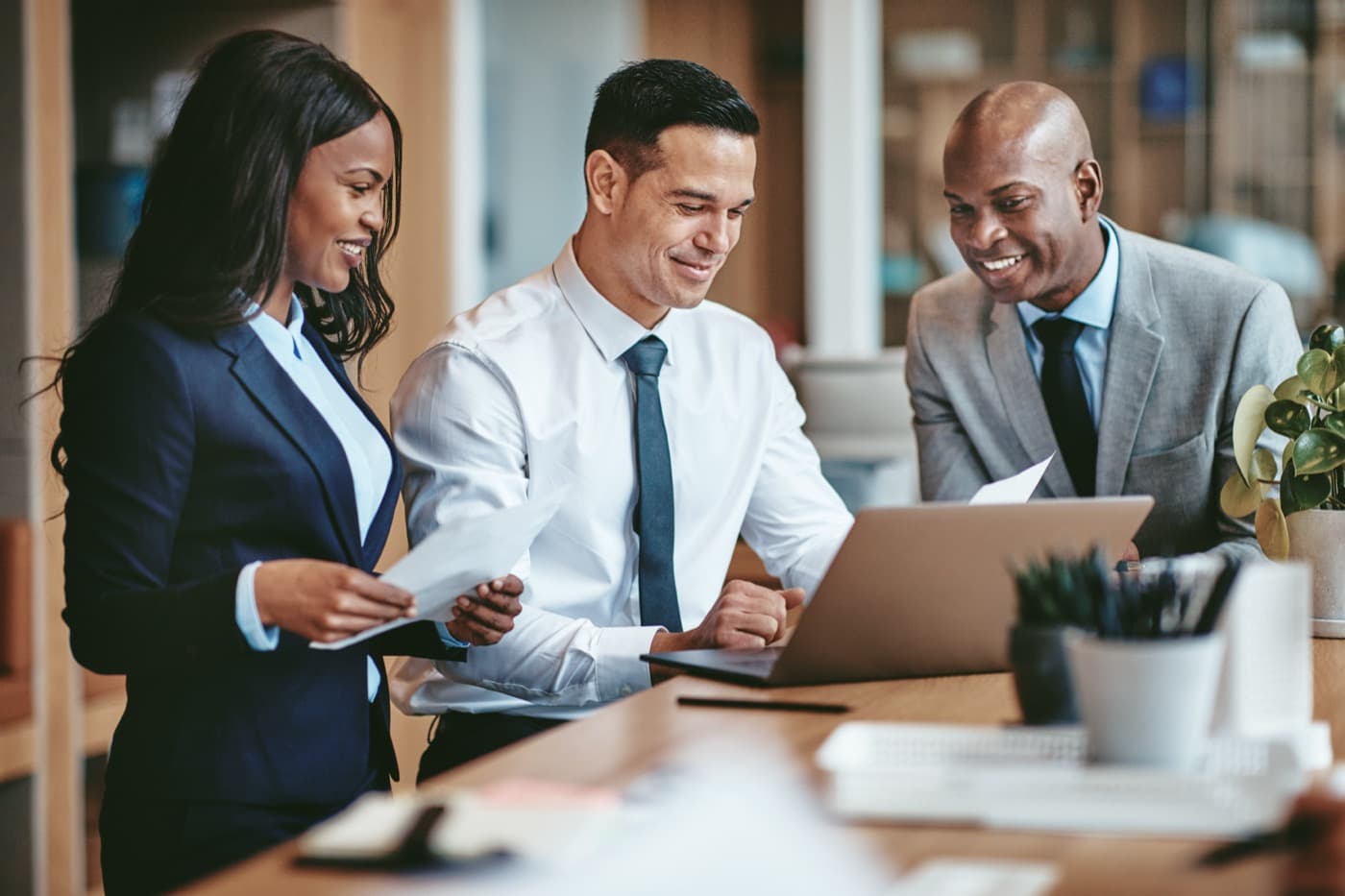 Attorneys reviewing a case in a modern law office