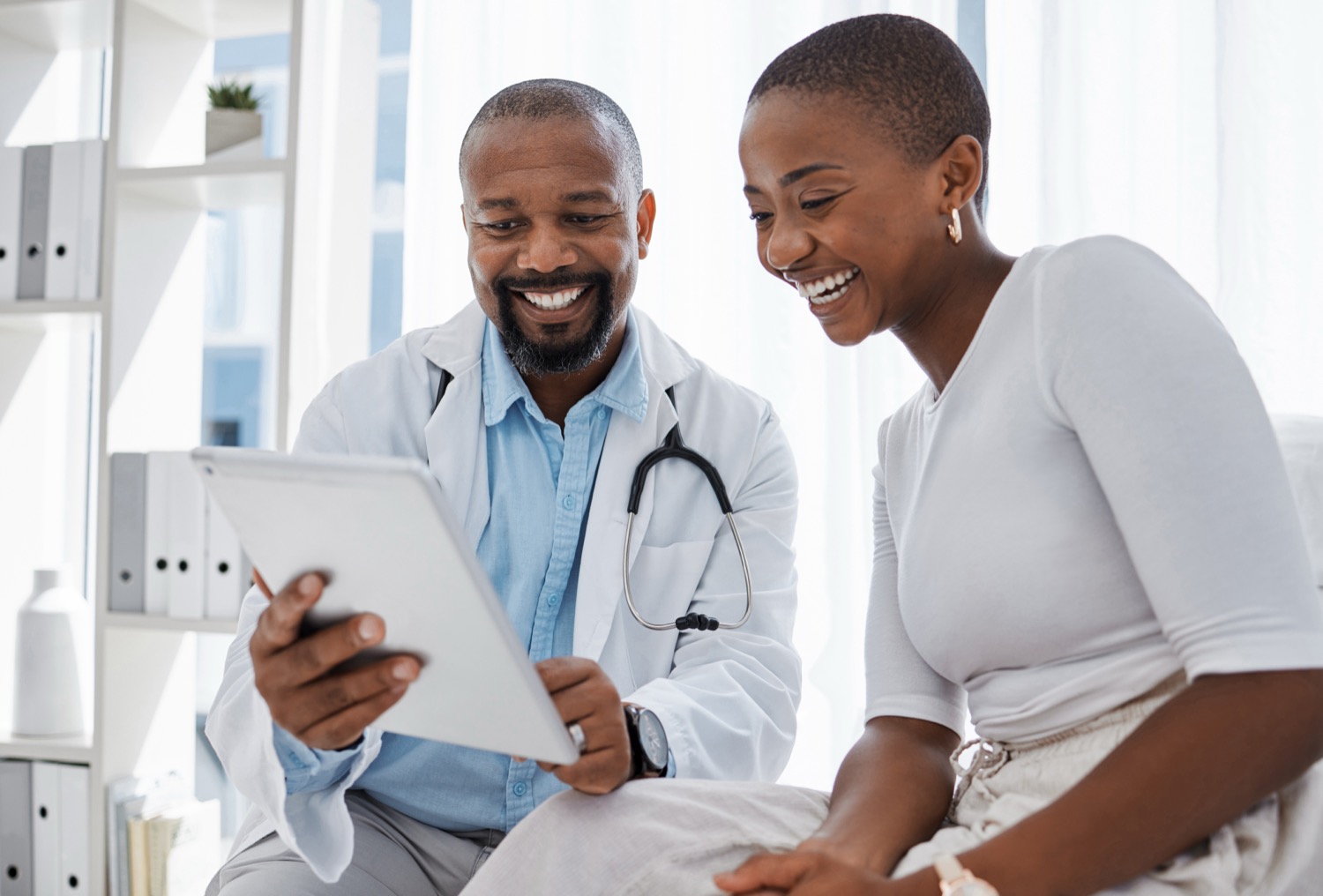 Physician performing a full-body skin cancer screening